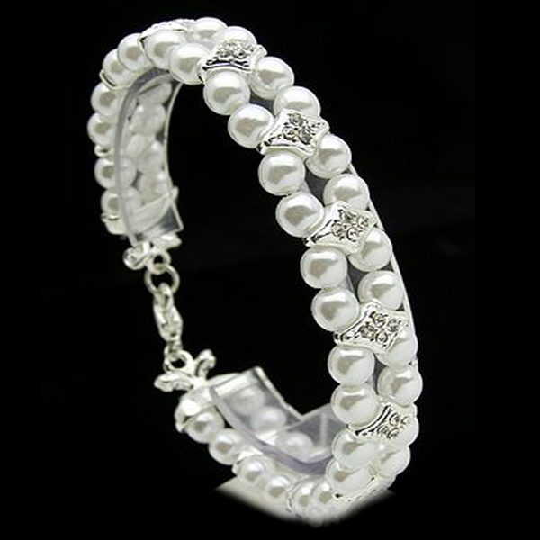  2 row stretch bracelet, genuine crystals in a stunning half inch wide lobster claw design.