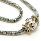 Two tone gold 1 inch heart with silver cz heart