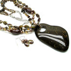 Big is beautiful with this brown and gold lucite 20 inch necklace with 3 inch chunky drop and earrings