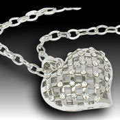 White Gold Plated Puff heart 26 x 22 x 14mm thick 16-18in. chain.Classic design
	 And elegant beauty