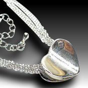 Multi strand Polished silver heart with an AAA CZ
