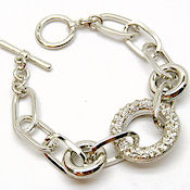 8193 $23  Rhodium plated toggle with rhinestone  7.5 inL 25mm circle 