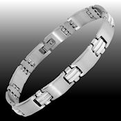 8234 $35 Ed force  stainless steel and rubber 48.G fold over clasp 11mm wide 9.25in long 3.mm thick