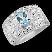 Stunning 1ct Genuine Topaz on sterling silver that has special carvings done absolutely stylish day or night 6.8g